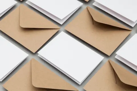 blank-white-card-with-kraft-brown-paper-envelope-template-mock-up