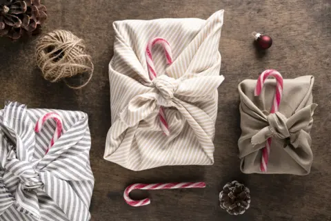 3-festive-still-life-christmas-wrapped-gift-arrangement