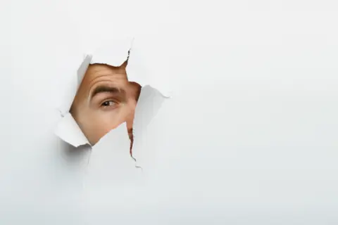 male-face-through-hole-paper-mixed-media-2