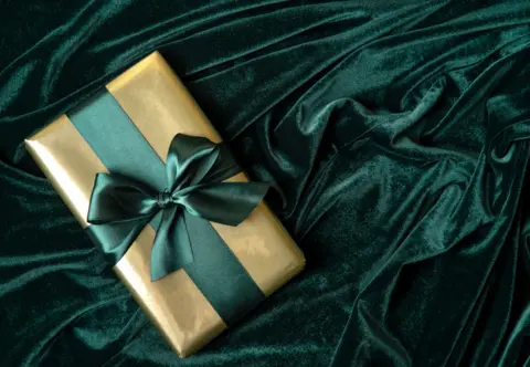 8-gift-box-wrapped-gold-paper-with-tidewater-green-satin-ribbon